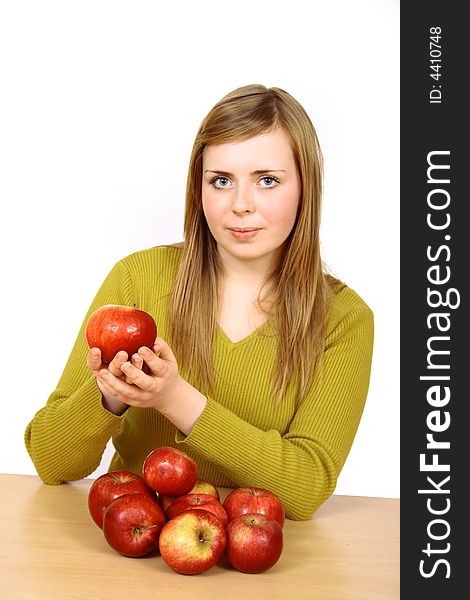 Beautiful young woman holding a apple