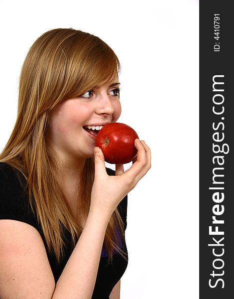 Beautiful young woman holding a apple