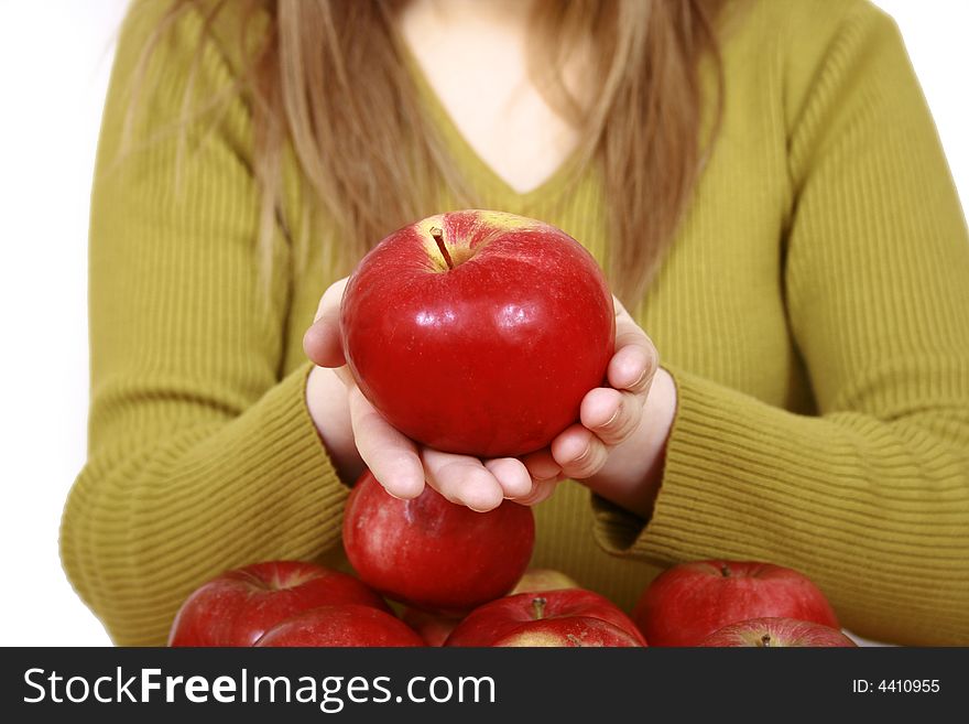 Beautiful young woman holding a apple