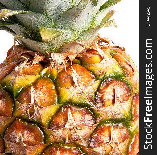 Detail of pineapple on white background