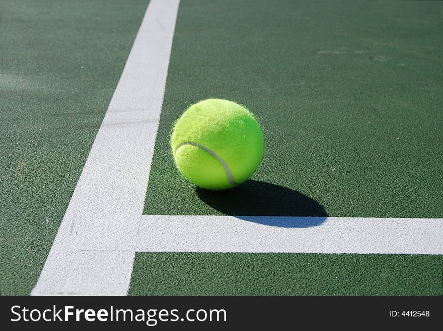 Tennis ball on the court. Tennis ball on the court