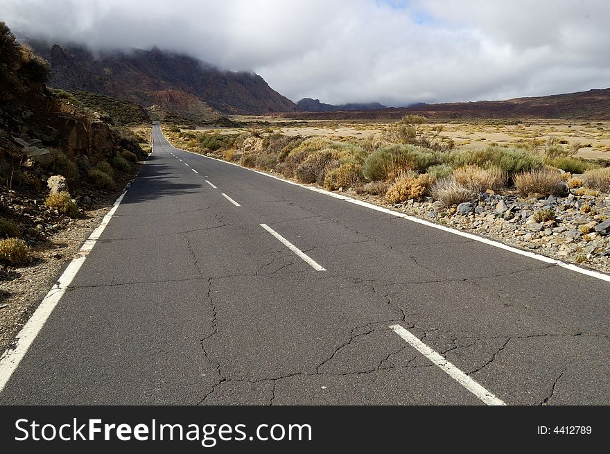 Cracked road in the crater of the Teide Volcano, Tenerife, Canary Islands. Cracked road in the crater of the Teide Volcano, Tenerife, Canary Islands