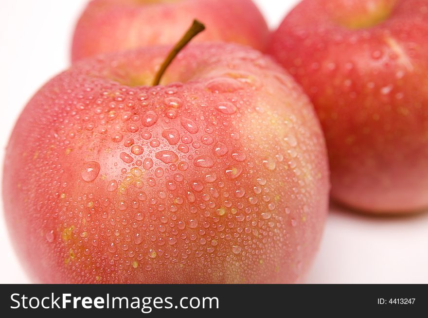 Red apples with drops of water. Red apples with drops of water.