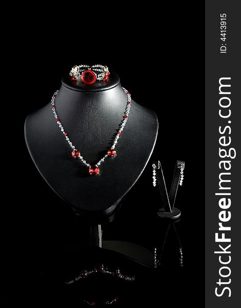 Necklace with watch on a black background. Necklace with watch on a black background.