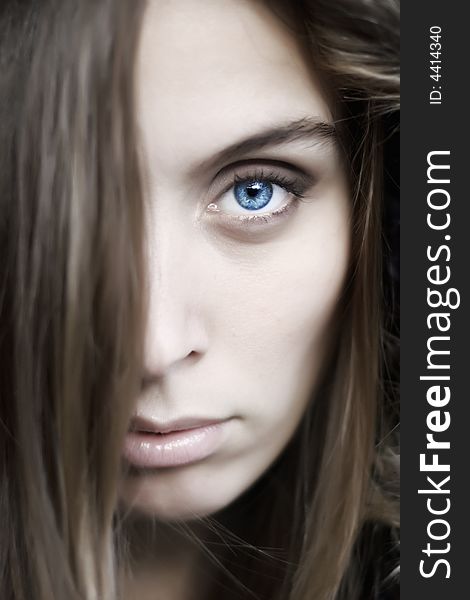 Portrait of a beautiful blue eyed young woman. Portrait of a beautiful blue eyed young woman
