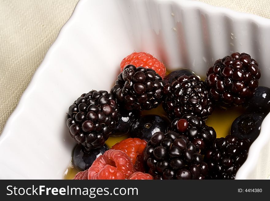 Healthy white bowl of ripe fruit in syrup. Healthy white bowl of ripe fruit in syrup
