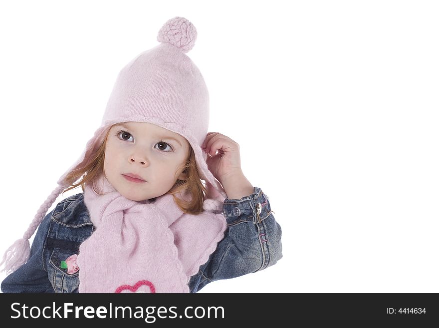 Cute little girl in winter outfit, studio shot, isolated