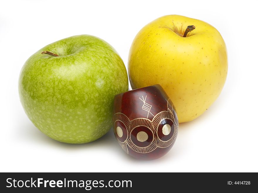 Long ornamented north-caucasian pipe with multicolored apples at white background. Long ornamented north-caucasian pipe with multicolored apples at white background