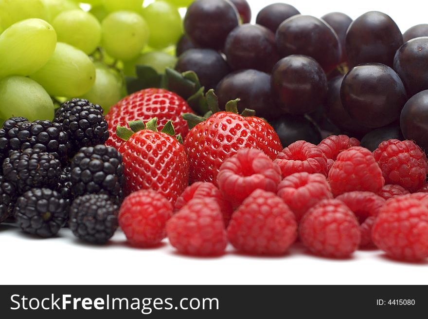 Berry assortment on white background