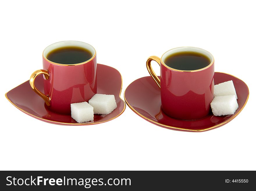 Two Crimson Heart-Shaped Cups of Coffee Isolated on White. Two Crimson Heart-Shaped Cups of Coffee Isolated on White