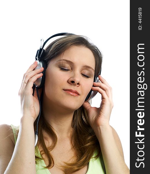 Pretty girl with headphones on white background