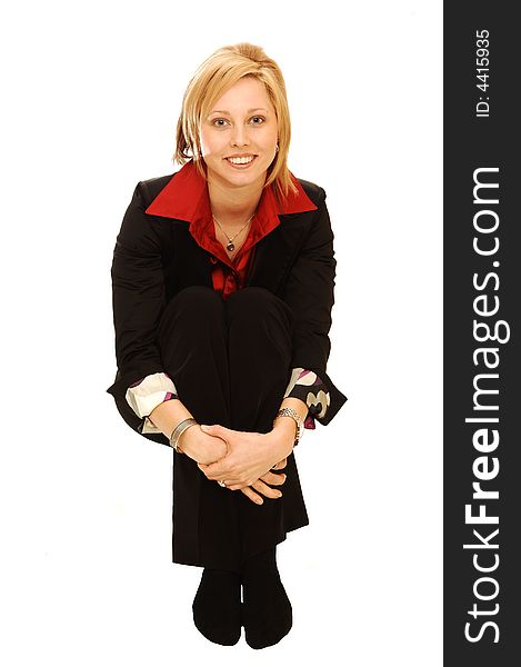 An friendly blond girl in an red blouse and black jacket sitting in an studio
for white background. An friendly blond girl in an red blouse and black jacket sitting in an studio
for white background.