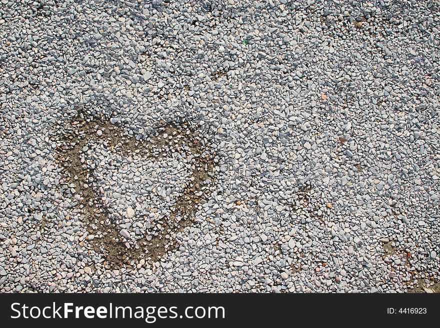 Painted heart over small stones and rocks. Painted heart over small stones and rocks