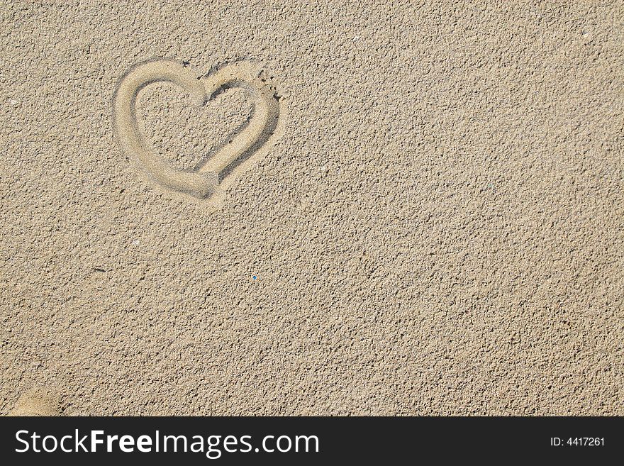 Heart over sand can be used as a background. Heart over sand can be used as a background