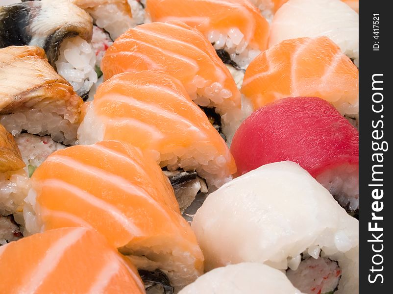 Still-life with close-up of japanese traditional food - rolls and sushi. Still-life with close-up of japanese traditional food - rolls and sushi