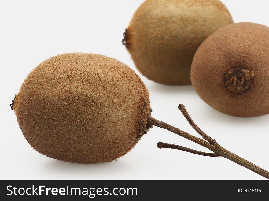 Three fresh kiwi