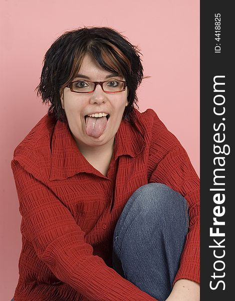 Crazy woman sticks out her tongue