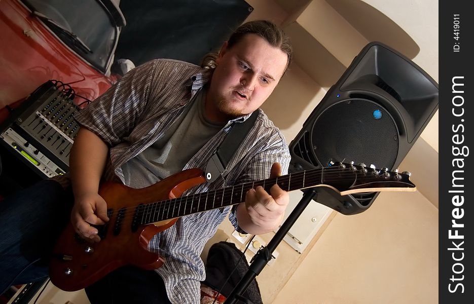 The musician with a guitar.  Concert of group StockDog in club the Woman-ljuba. Rostov-on-Don. Russia