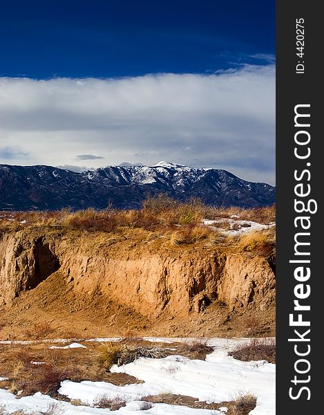 Winter among the southern Colorado high desert as the snowy Rockies stand in the background. Winter among the southern Colorado high desert as the snowy Rockies stand in the background