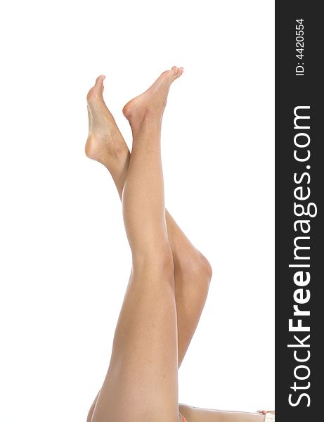 Woman legs on isolated background