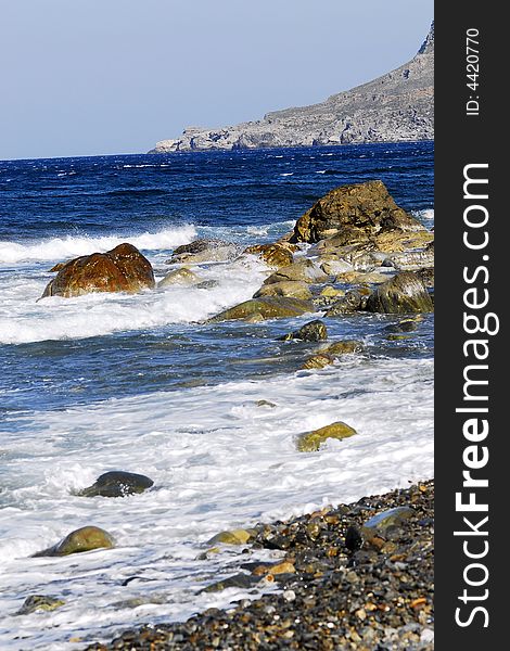 Rocky seaside of the blue mediterranian sea. Rocky seaside of the blue mediterranian sea