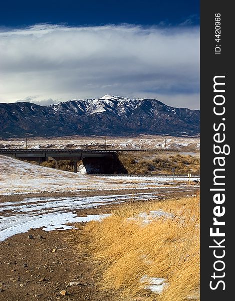 The Southern high desert of Colorado pictured in winter with mountains. The Southern high desert of Colorado pictured in winter with mountains