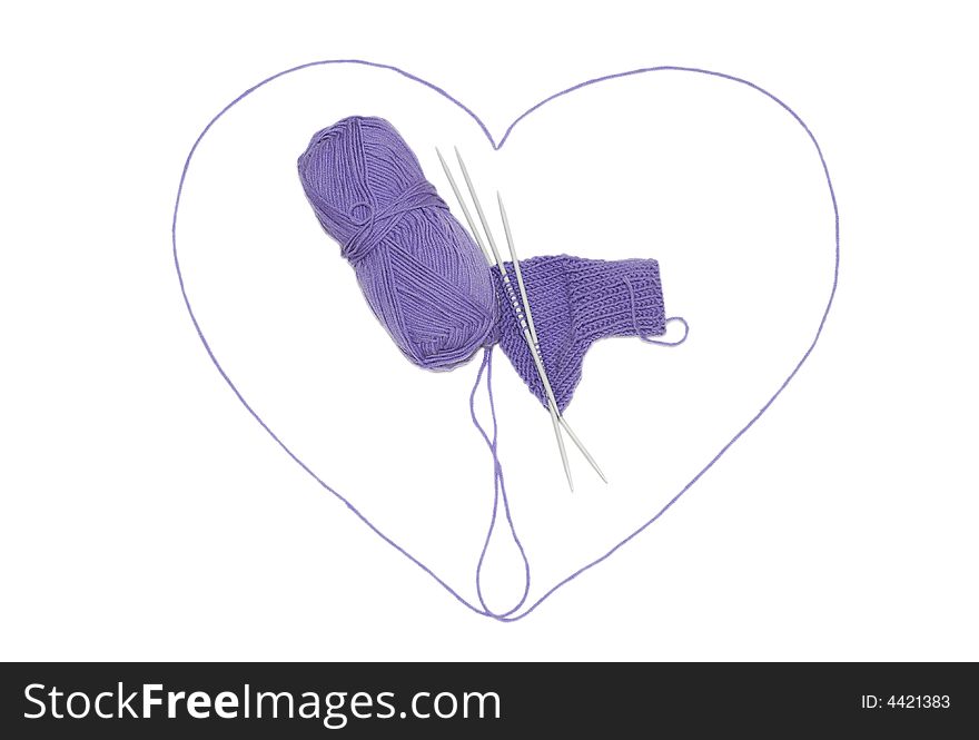 A heart made by knitting thread isolated on white. A heart made by knitting thread isolated on white