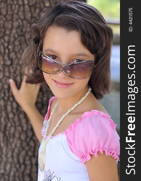 Young Girl With Sunglasses