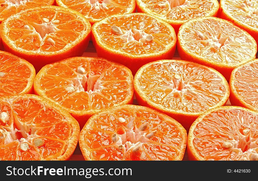 Ripe orange mandarine cutted in half