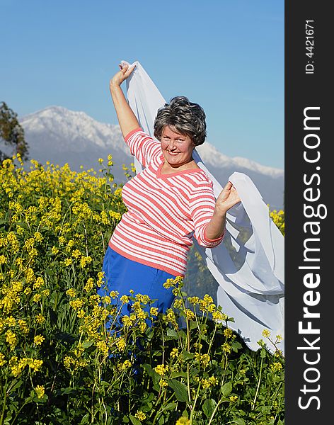 Older woman feeling free and healthy outside. Older woman feeling free and healthy outside