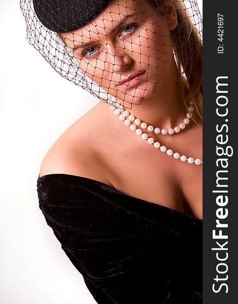 Portrait of young lady in black with veil