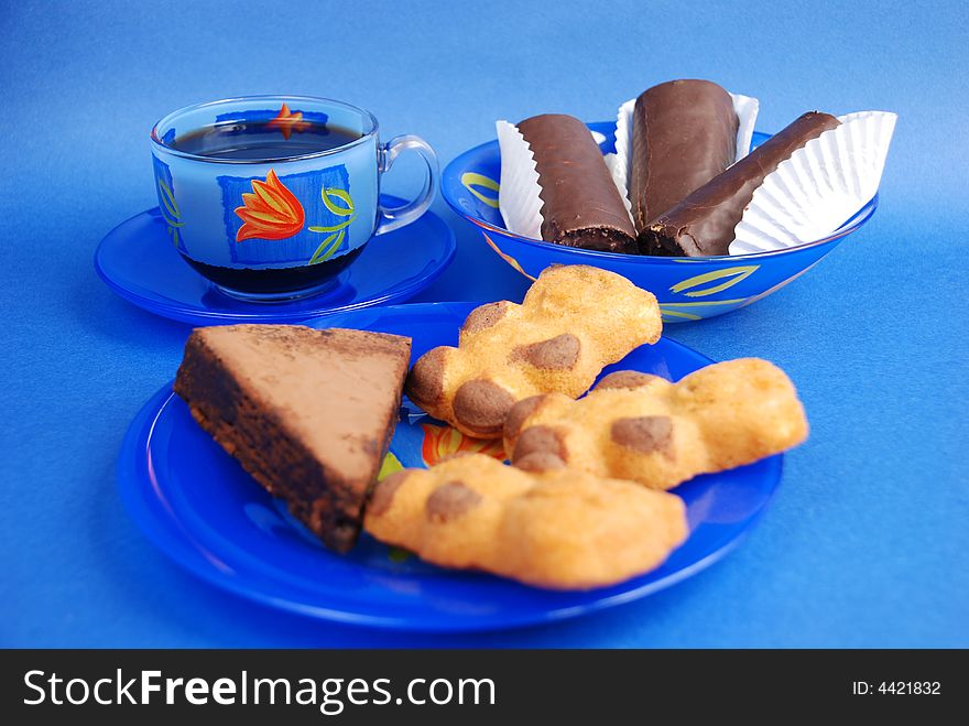 Cup of coffee and sweet cookies close up. Cup of coffee and sweet cookies close up