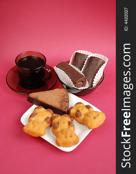 Cup of coffee and sweet cookies close up. Cup of coffee and sweet cookies close up