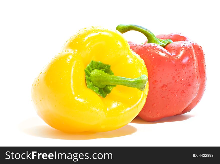 Two bulgarian peppers isolated on a white background