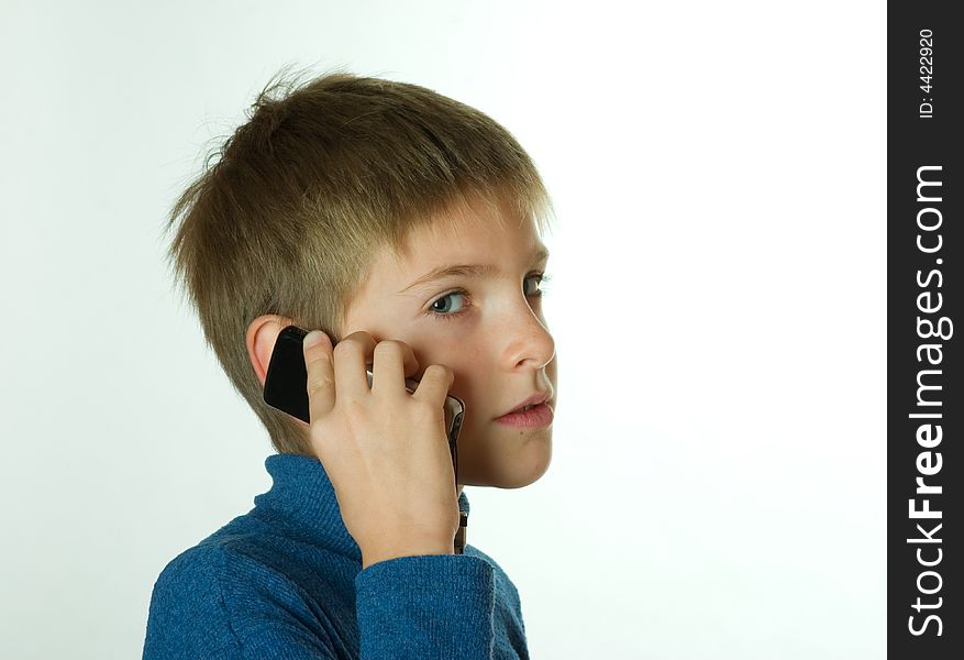 Little Boy Talking By Cell Phone