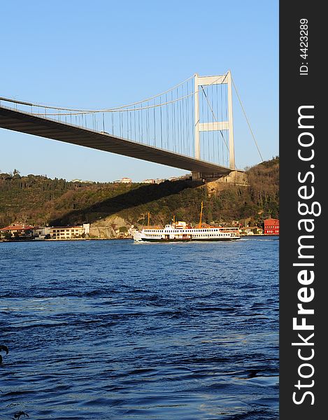 Istanbul Turkey. Ferry passing by Bosphorus bridge. Istanbul Turkey. Ferry passing by Bosphorus bridge