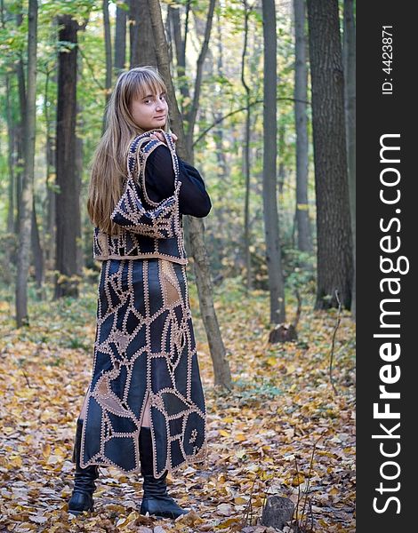 Portrait of the beautiful girl in autumn forest. Portrait of the beautiful girl in autumn forest.