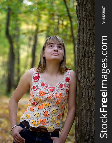 Portrait of the beautiful girl in autumn forest. Portrait of the beautiful girl in autumn forest.