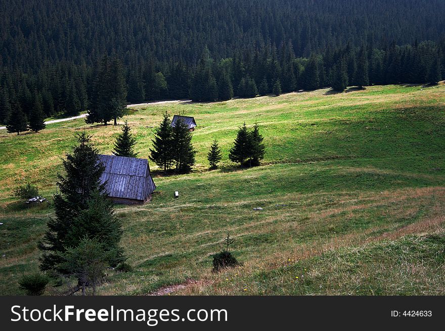 Mountains, House And Meadow