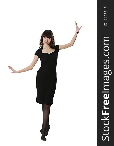 Portrait of the beautiful woman in a black dress. Portrait of the beautiful woman in a black dress