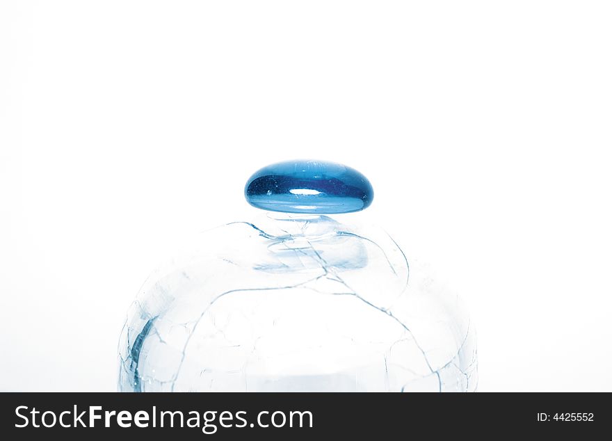 Round blue stone in a glass sphere. Round blue stone in a glass sphere