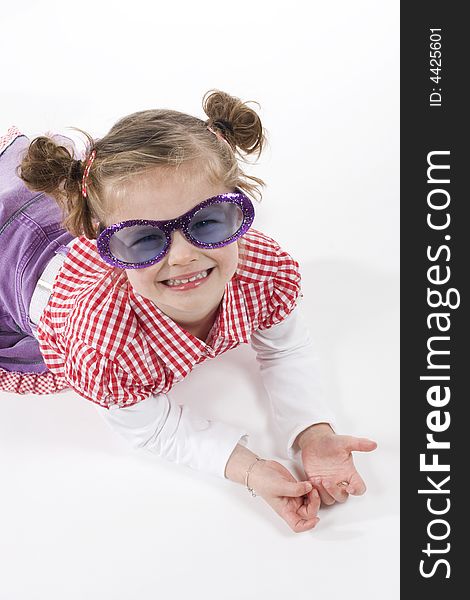 Cute little girl with funny sunglasses. Cute little girl with funny sunglasses