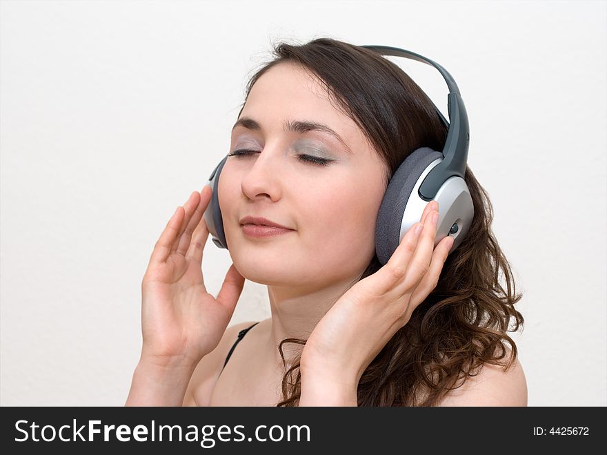 Young Woman Listening Music