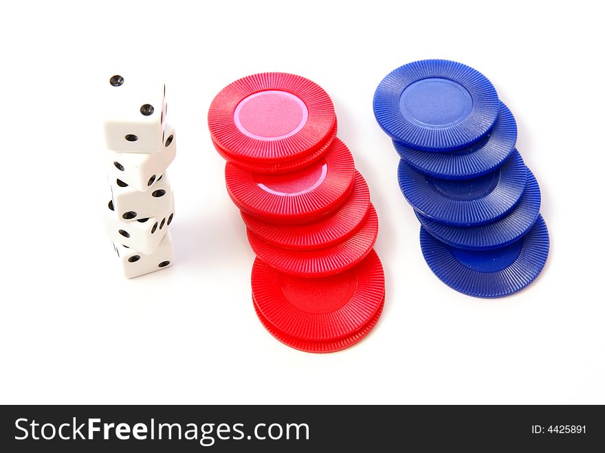 Multiple white dice with red and blue poker or game chips. Full deep depth. Multiple white dice with red and blue poker or game chips. Full deep depth.