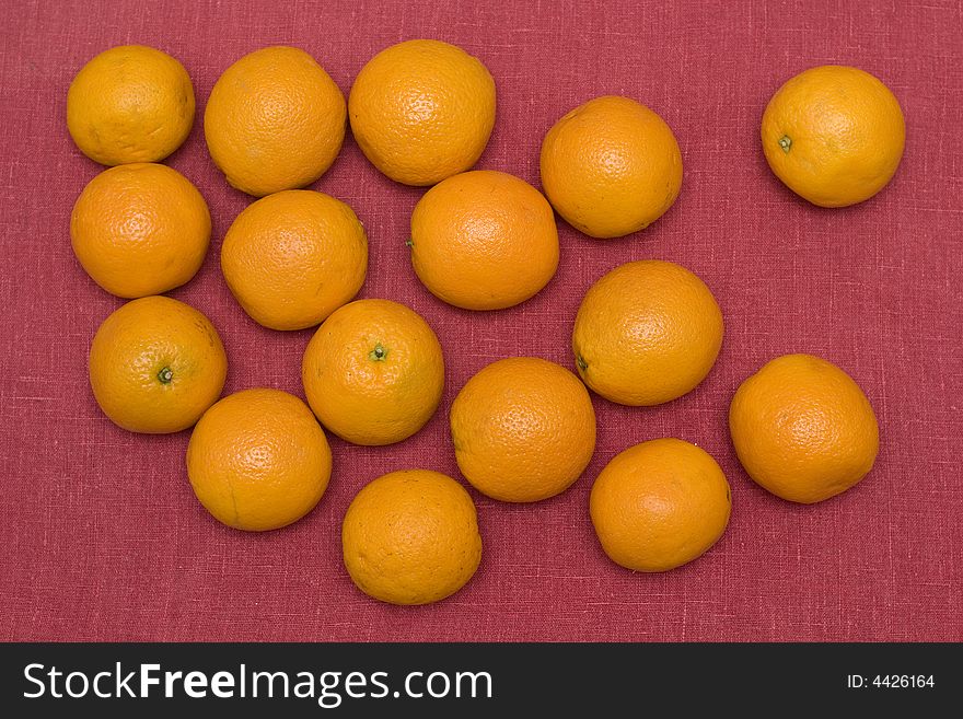 Oranges Over Red Background