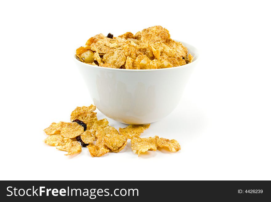 Cornflakes in bowl over white background. Cornflakes in bowl over white background