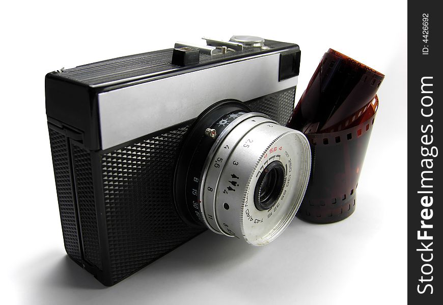 Old Simple Camera Isolated With Film