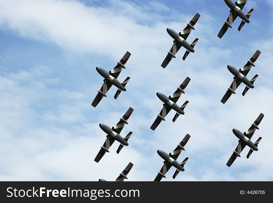 The italian acrobatic patrol Frecce Tricolori cross the sky