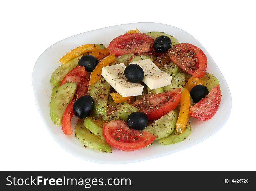 Greek salad isolated on white