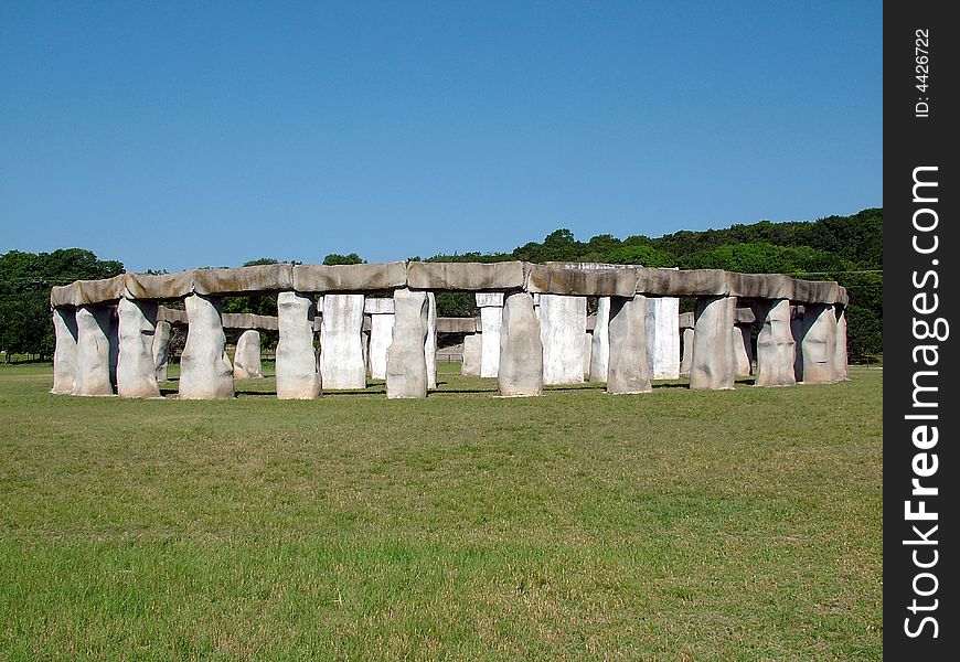 This replica of Stone Henge from a distance shows its circular form. This replica of Stone Henge from a distance shows its circular form.
